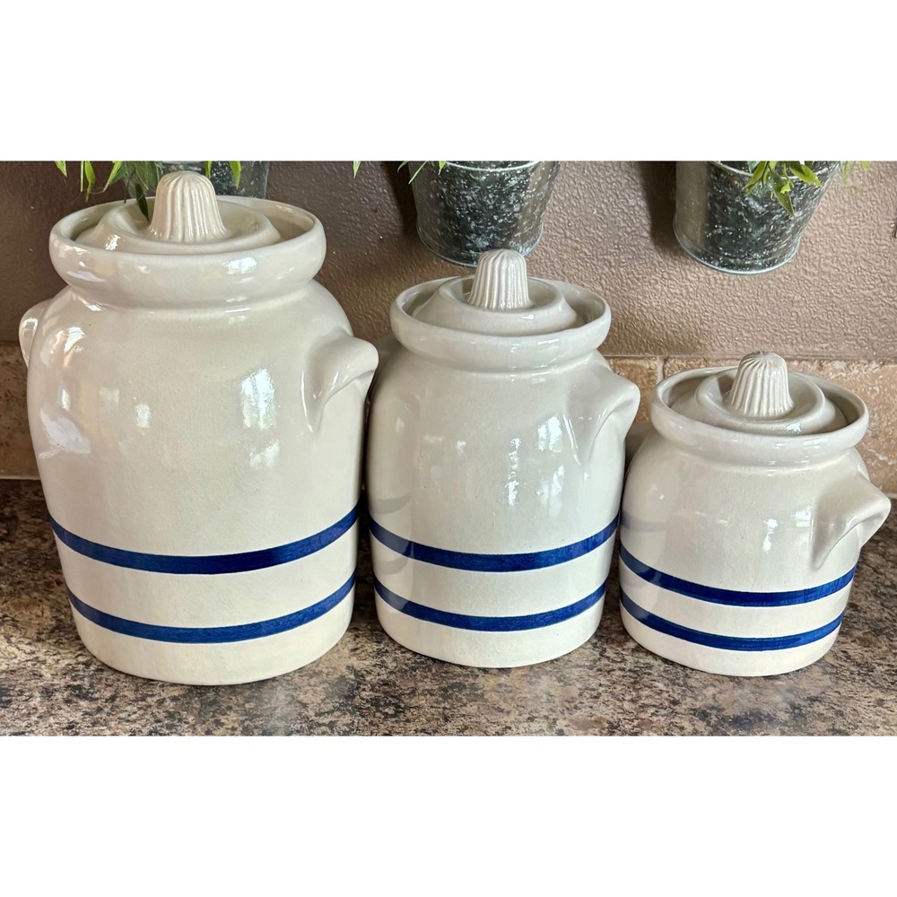 Complete set of Robinson Ransbottom canisters (1 pint, 1 qt, 2 qt).